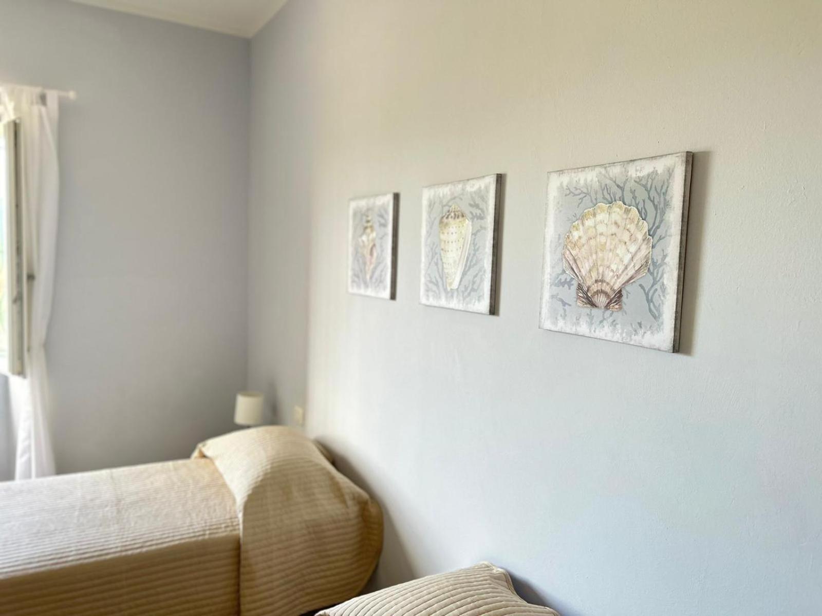 Appartement Domo Deledda à Posada  Chambre photo